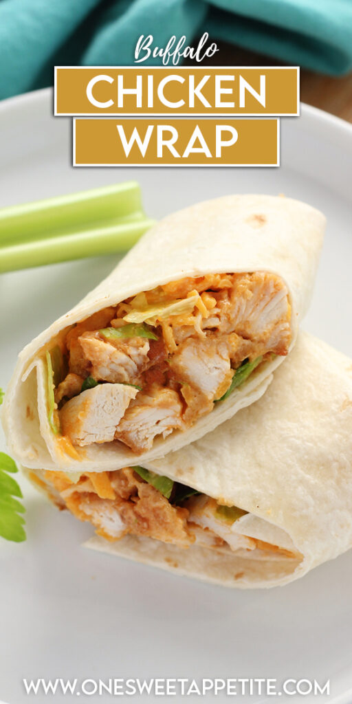 close up image showing a chicken wrap that has been sliced in half. The two halves are sitting on a white round plate with a celery off in the back