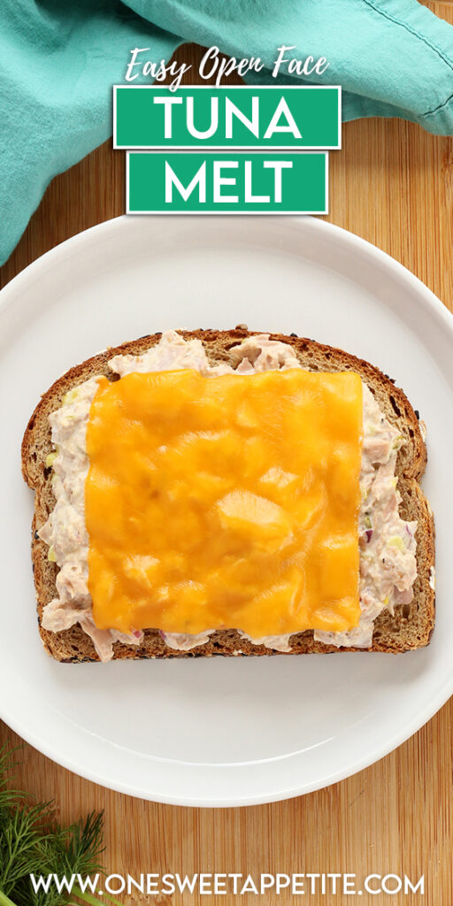 top down image close up to an open faced sandwich with tuna and melted cheese. The sandwich is sitting on a white round plate that is on a wooden table top with fresh dill and a teal napkin off to the side. Text overlay reads "easy open face tuna melt"